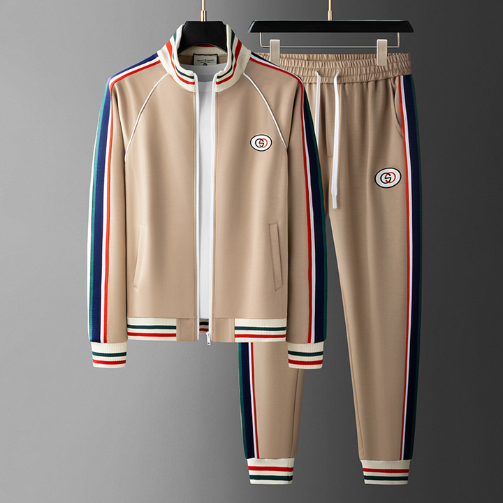 Athletic men's full-zip tracksuit. Royal Navy and cream striped design, great for activewear and everyday style.