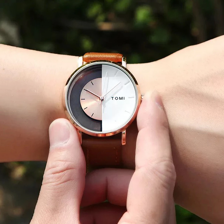 Men's Eclipse watch, black leather strap, half-dial, modern analog design, timeless.