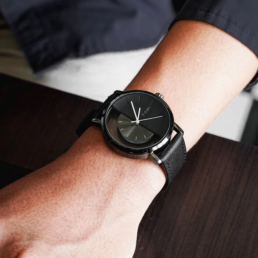 Stylish Eclipse men's timepiece, black leather band, unique half-dial, a true statement piece.