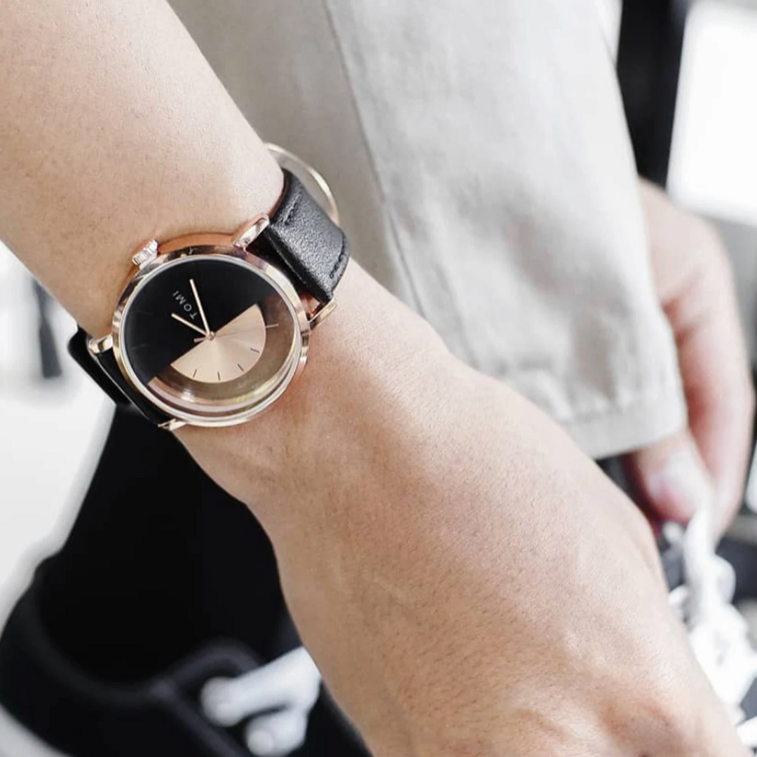 Leather strap men's watch with polished pin buckle, Eclipse half-dial, modern style.