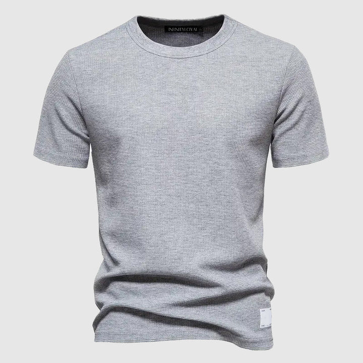 Stylish men's casual tee with a modern fit, perfect for refined summer fashion and comfort.