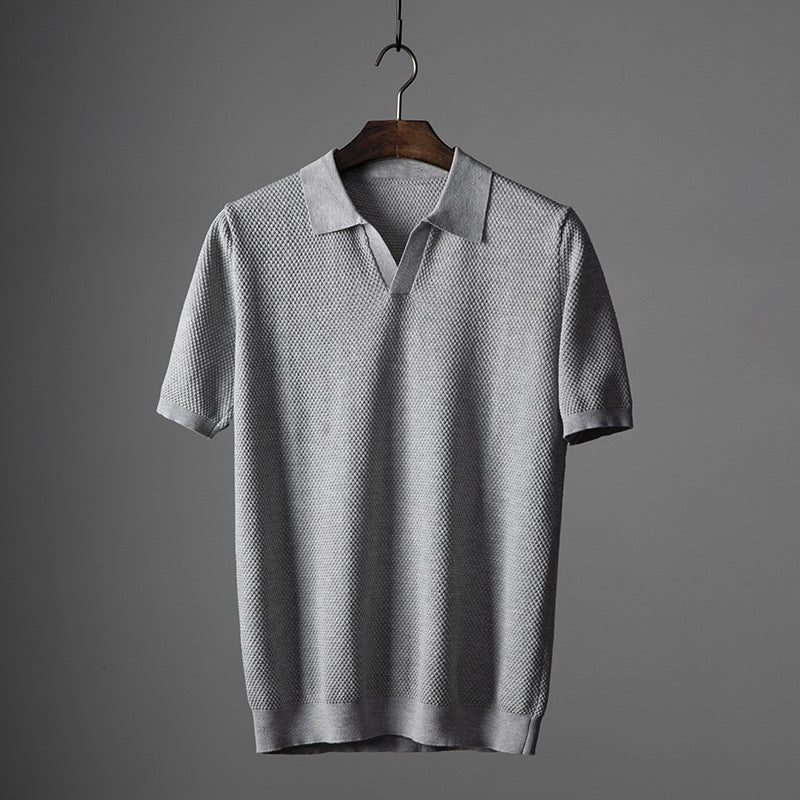 Dark blue men's smart casual knit polo shirt, ideal for everyday style.