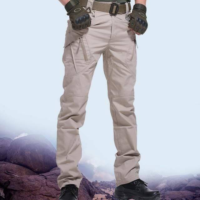 Unzipped men's camouflage cargo pants pocket, showcasing spacious storage