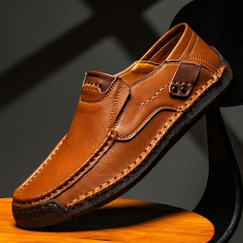 Men's elegant black slip-on loafers, perfect for effortless style & casual or dress wear. Comfortable mens fashion footwear.