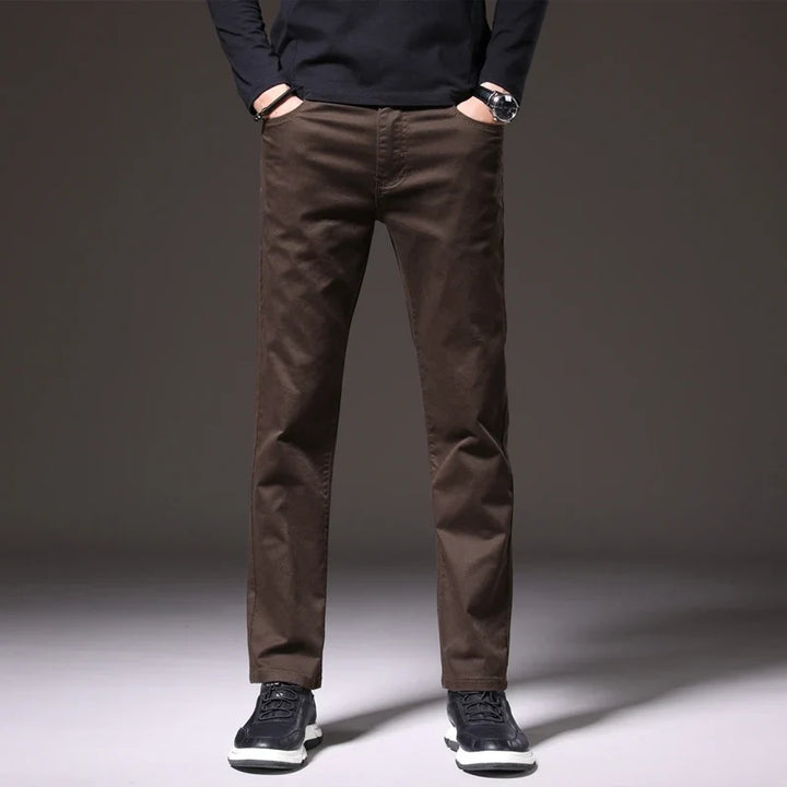 Navy blue Elio men's cotton chino trousers, versatile casual pants for a relaxed look.