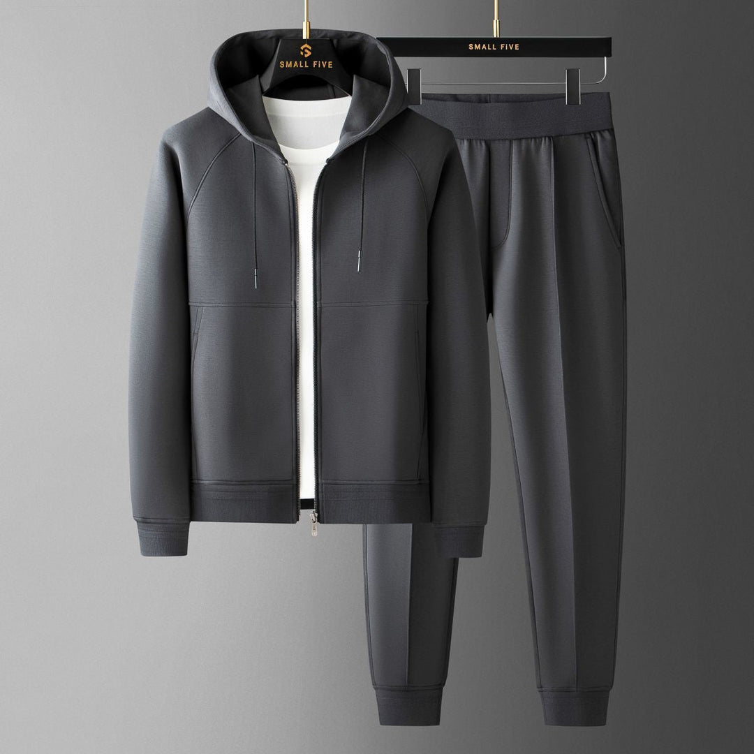 Man in full men's elite tracksuit set, showcasing ultimate comfort, athletic style & premium loungewear.