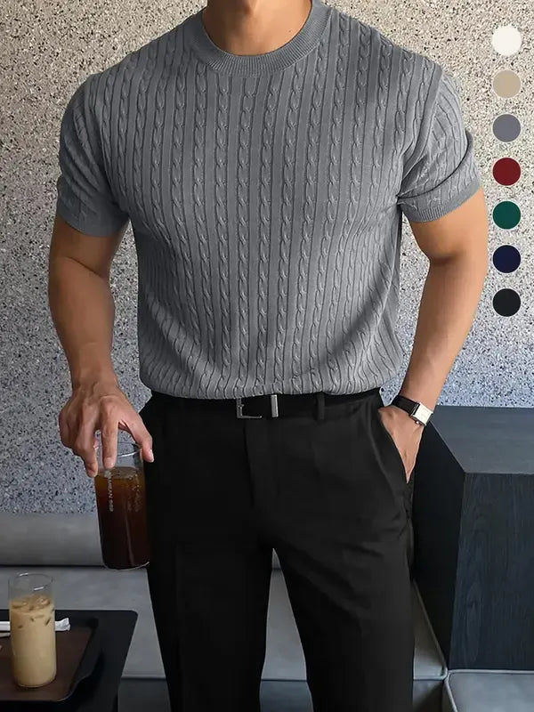 Close-up of men's Elviro cable knit tee. Short sleeve, crew neck knit shirt with a modern, polished fit.