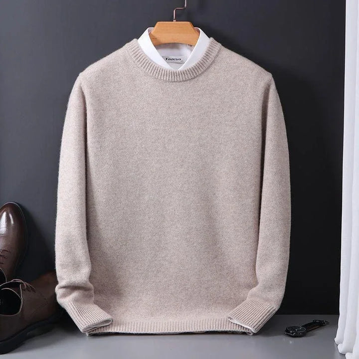 Model wearing a stylish men's Emory long sleeve sweater, offering elegant comfort for winter fashion looks.