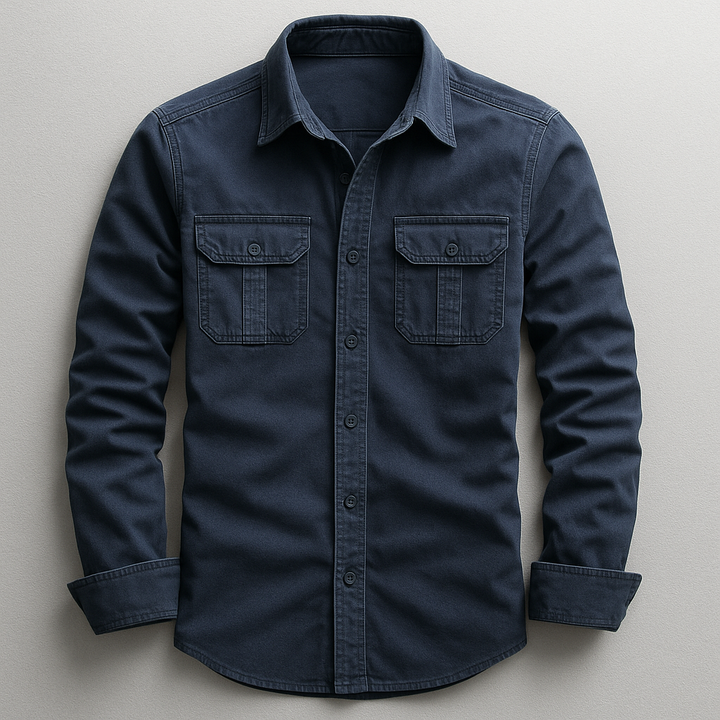 Close-up of a men's collared button-up tailored shirt. Showing long-sleeve detail, quality fabric for everyday comfort.
