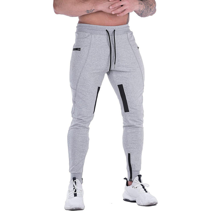 Stylish tapered joggers for men, made from a comfortable cotton blend with an adjustable drawstring.