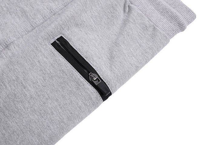 Close-up of comfortable cotton blend fabric on men's tapered joggers, showing texture.