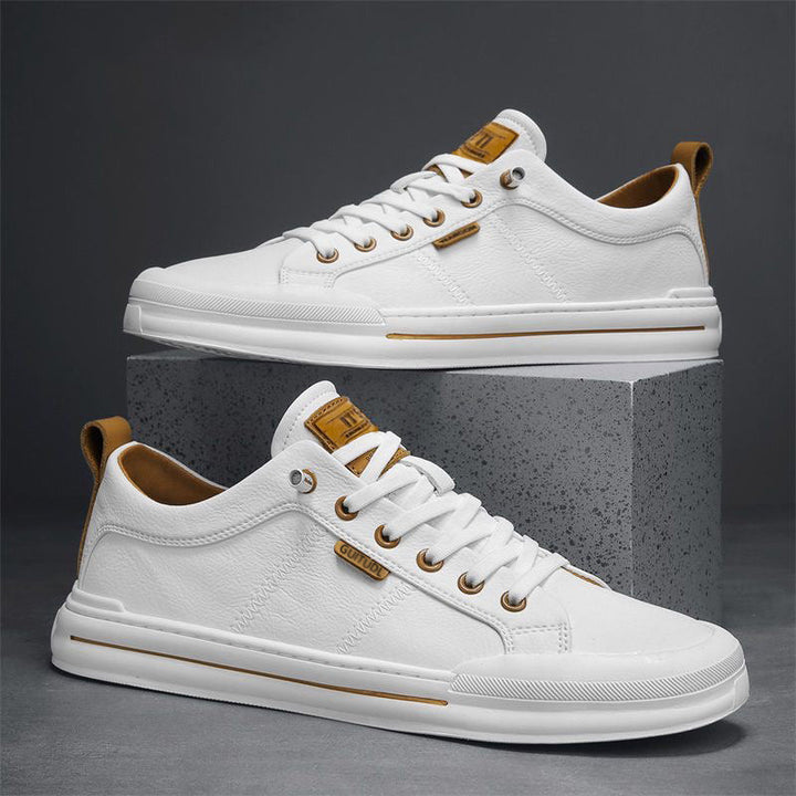 Stylish men's low-top casual sneakers in black, offering versatile everyday comfort.