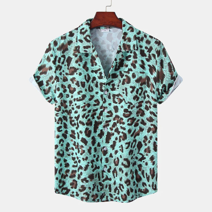 Vibrant exotic print men's casual shirt with short sleeves & a classic button-down design. Stylish.