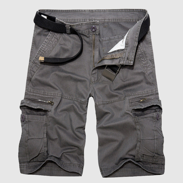 Man hiking in comfortable Men's Explorer Cargo Shorts, perfect for summer outdoor adventures.