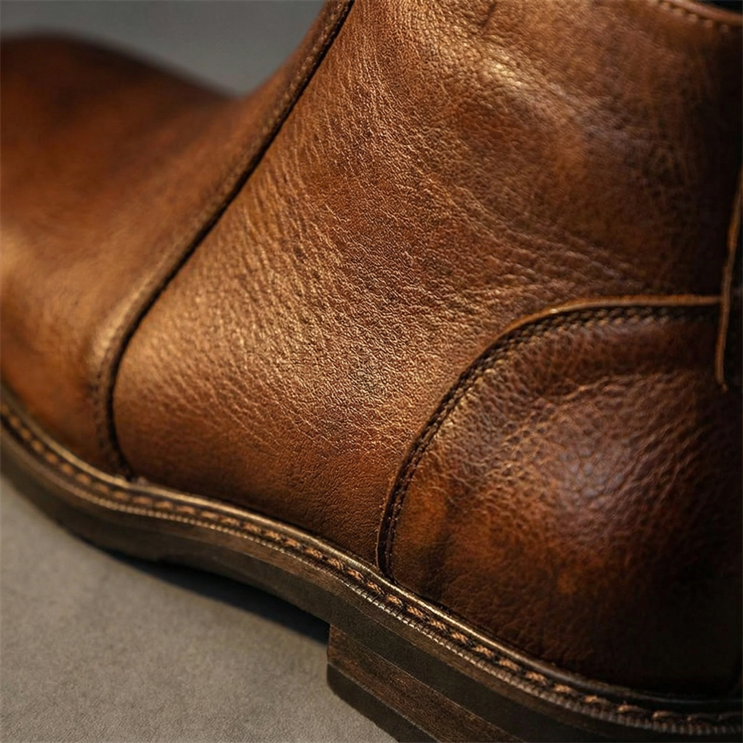 Stylish men's full-grain leather ankle boots with comfortable design. Durable choice for everyday wear.