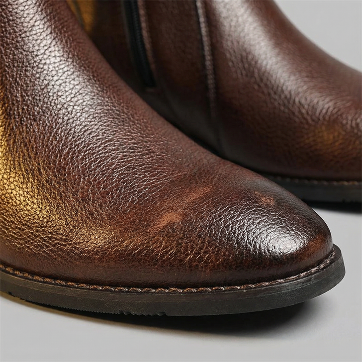 Sturdy men's full-grain leather work boots. Provides excellent protection and comfort for long days.