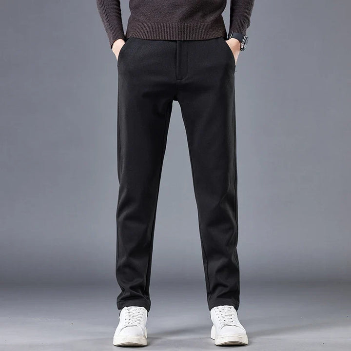Modern black men's contour fit pants. Tailored comfort & stretch for versatile casual or office wear.