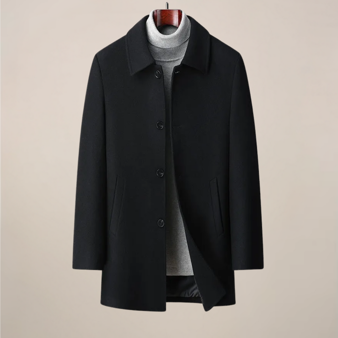 Back view of a tailored men's herringbone overcoat, a modern and elegant fall/winter jacket for men.