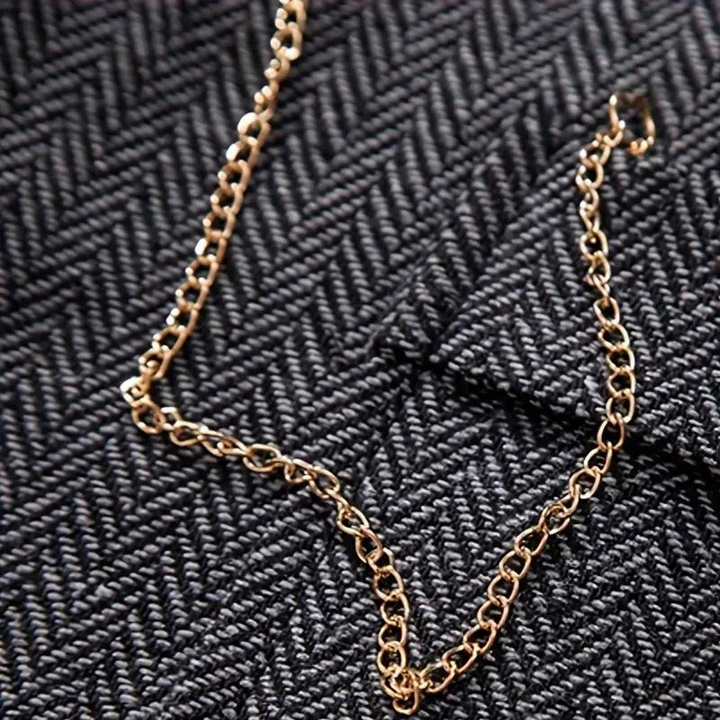 Classic grey herringbone men's vest, offering a refined, layered look for both formal and everyday wear.