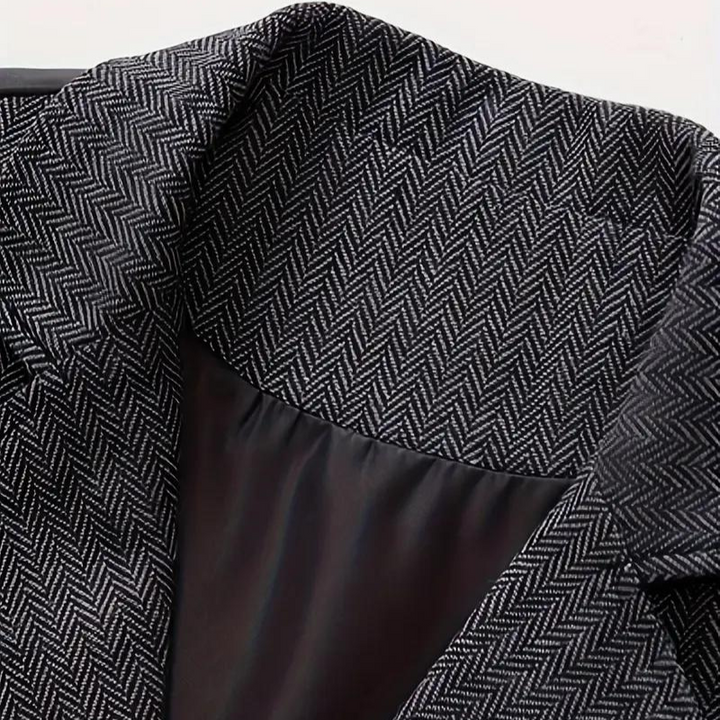 Men's fashion statement: a classic herringbone waistcoat, perfect for a sophisticated and elegant all-season look.