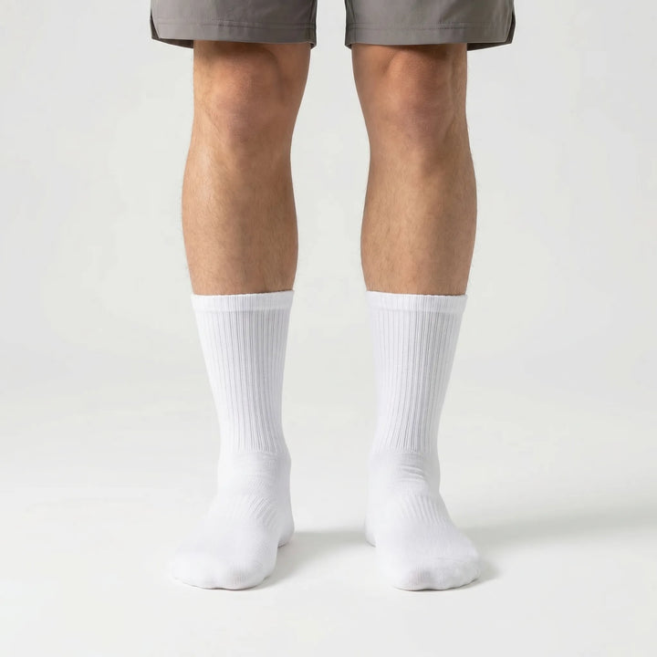 High-tube men's compression sports socks (3-pack). Moisture-wicking activewear for basketball, cycling & training.