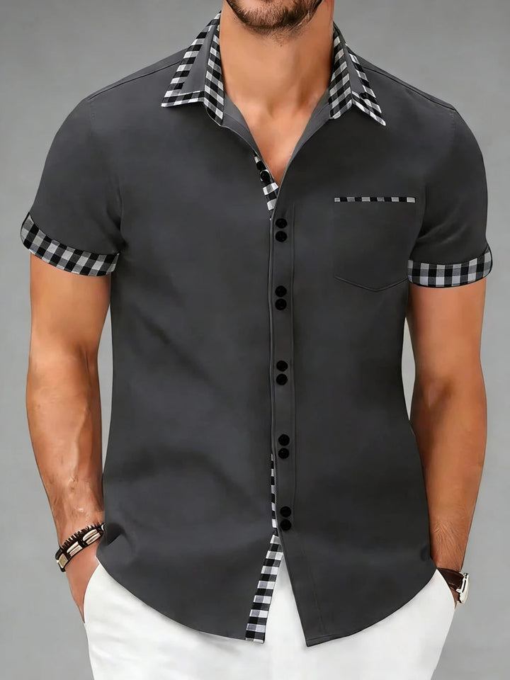 Man wearing a Hudson checkered tailored button-up shirt. Versatile for smart casual & business events.