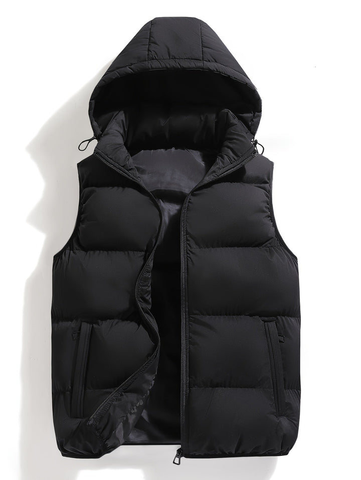 Multi-use men's hooded puffer vest. Insulated, weather-resistant, and lightweight for various winter layering needs.