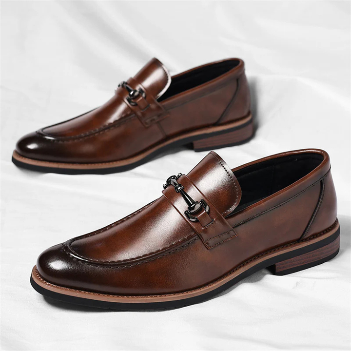 Sleek men's Italian loafers, versatile for formal or casual wear. Comfortable slip-on design, durable sole.
