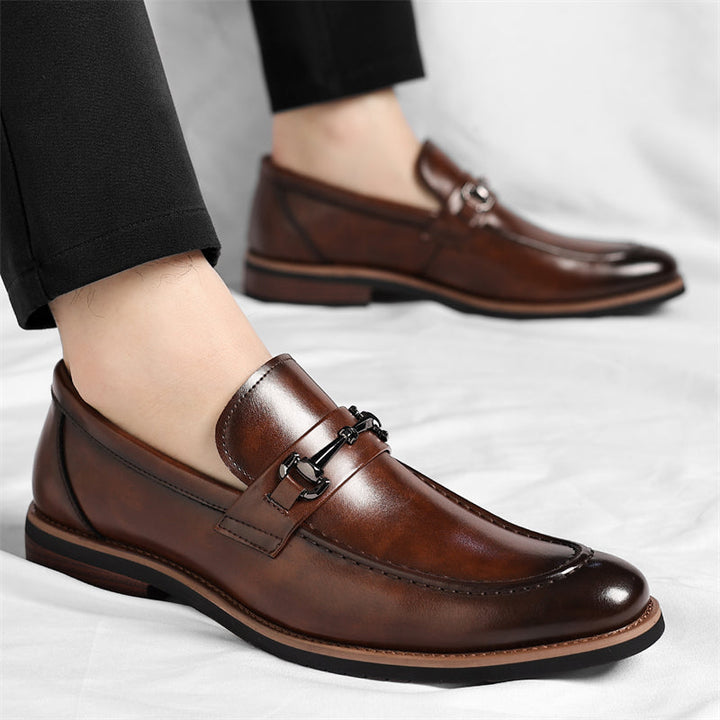 Men's sleek Italian leather loafers. Slip-on comfort shoes with a durable sole for everyday wear.