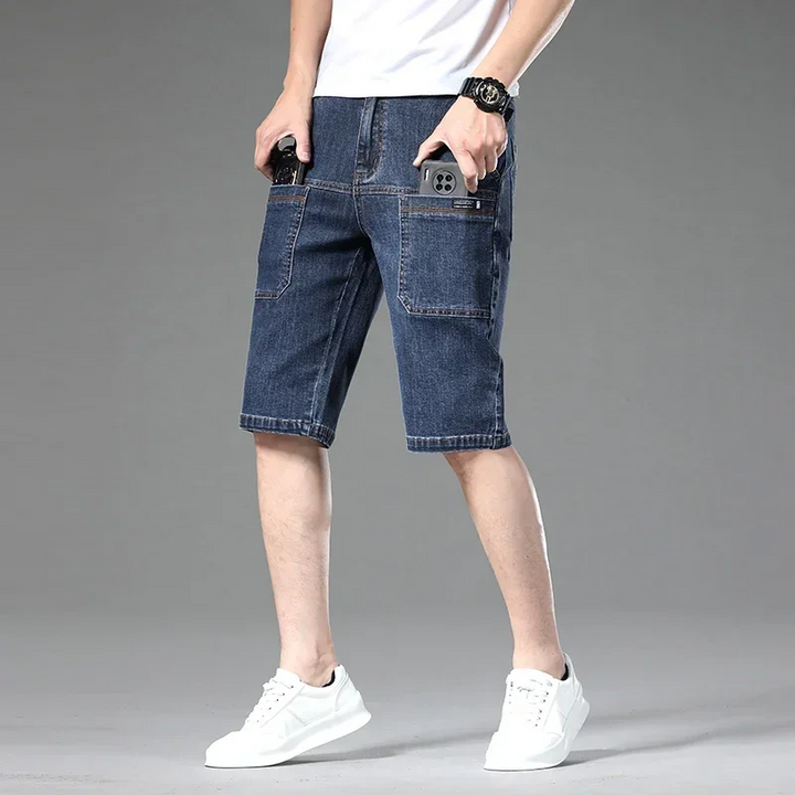 Durable men's Jefferson denim multi-pocket shorts, comfortable modern fit for practical everyday wear.