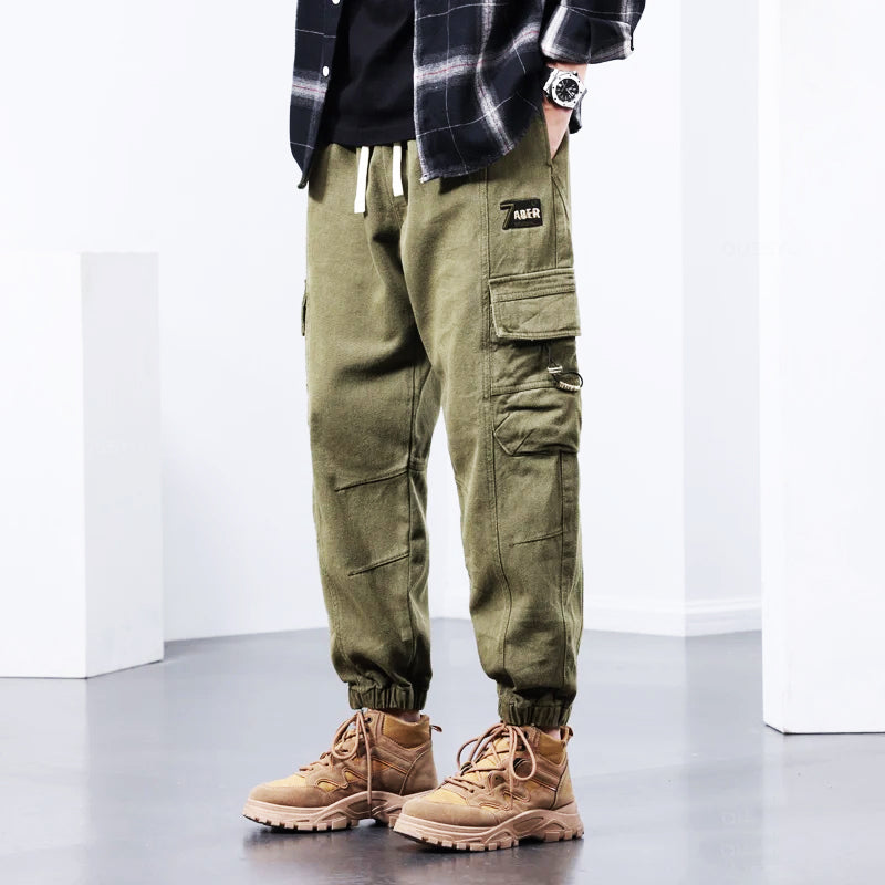 Durable green Kellan men's cargo pants, ideal for casual wear, workwear & outdoor activities.