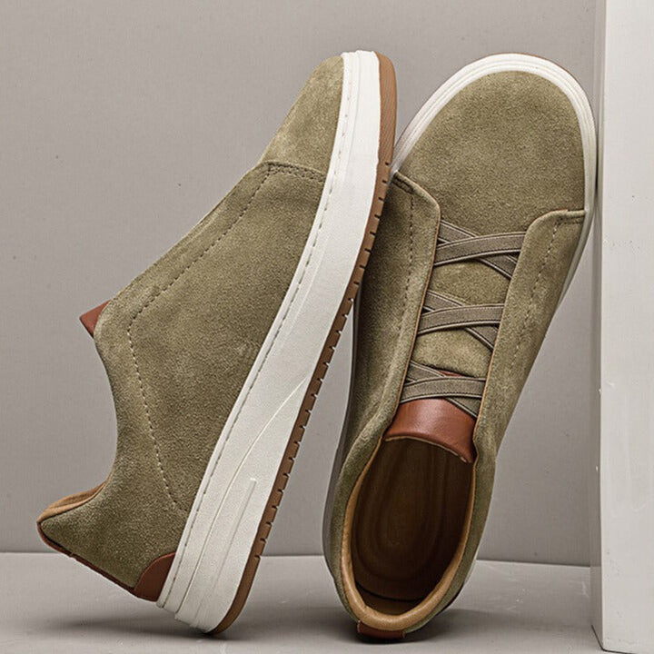 Polished black men's slip-on shoes, refined look for everyday casual wear.