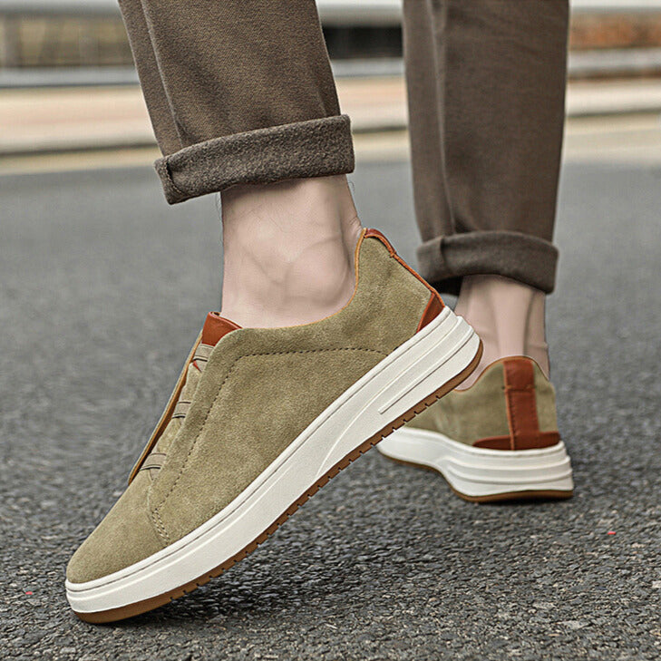 Men's blue slip-on casual footwear, offering ultimate comfort and refined fashion.