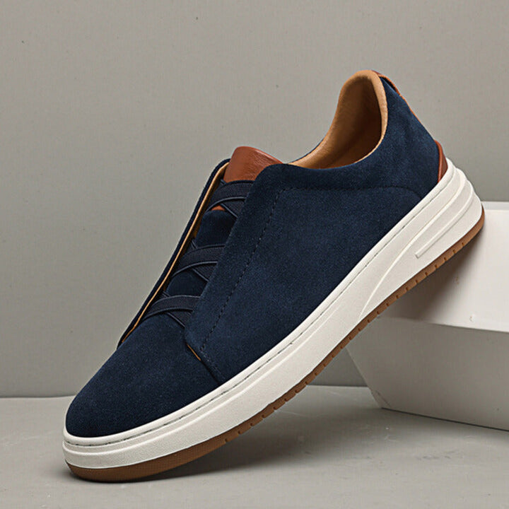 Blue men's slip-on sneakers, comfortable casual shoes with a polished look.
