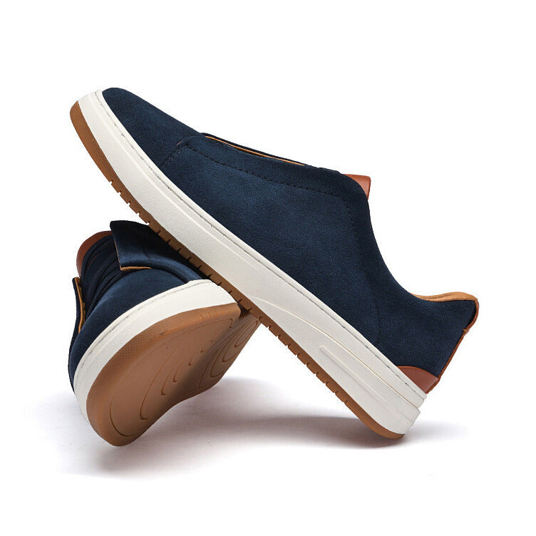 Stylish blue slip-on sneakers for men, offering effortless comfort & durable design.