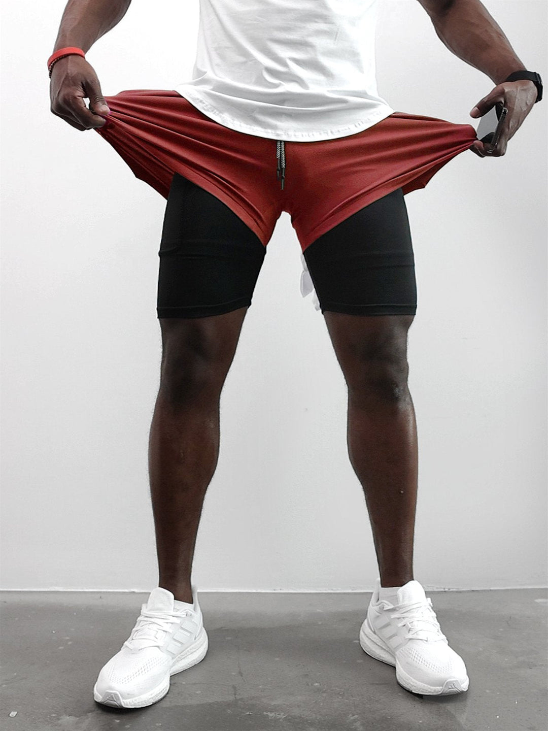 Side view of men's Kinetic mesh shorts, showcasing athletic fit for dynamic training.