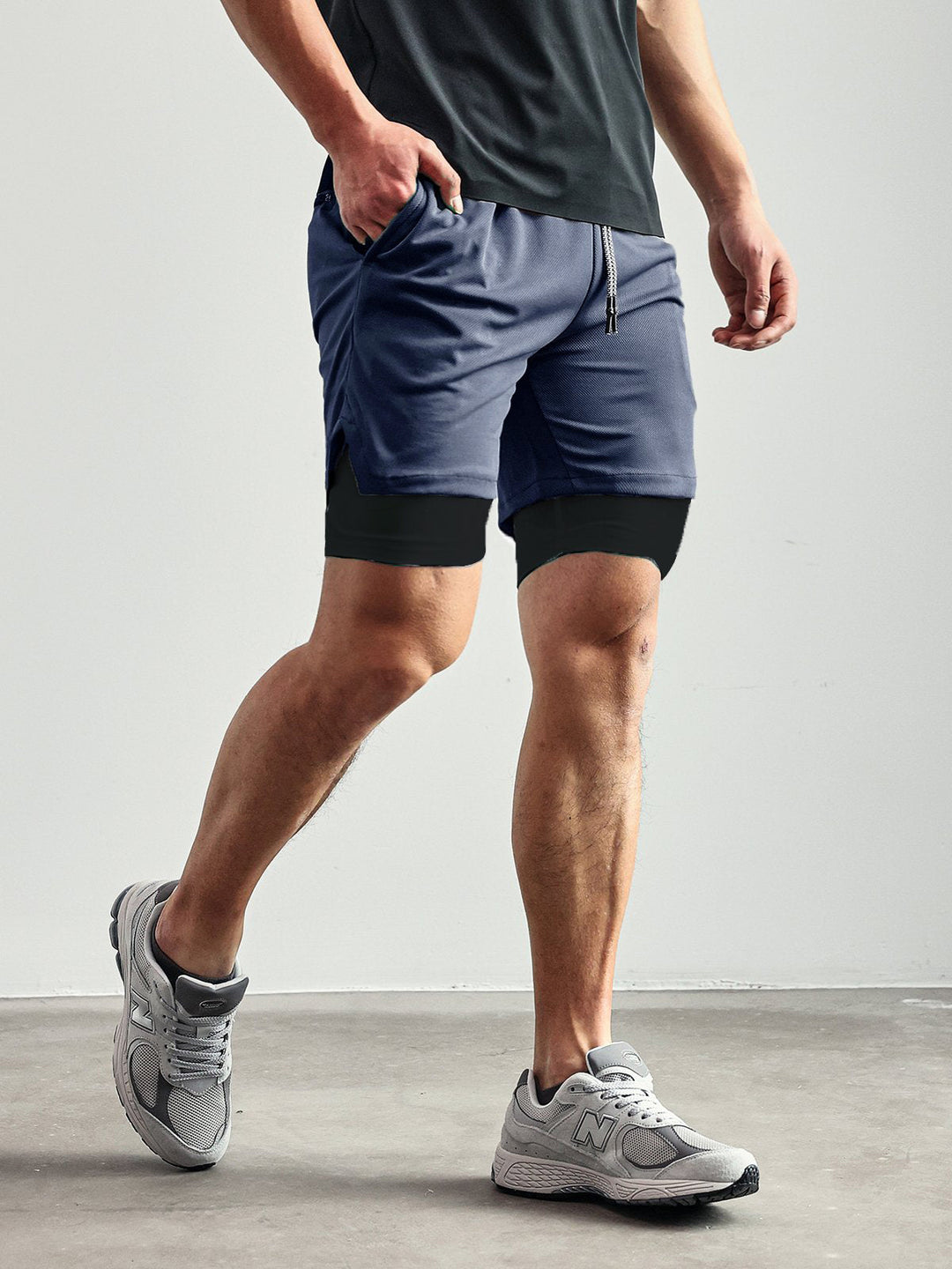Back view of men's Kinetic mesh gym shorts, ideal for activewear and fitness routines.