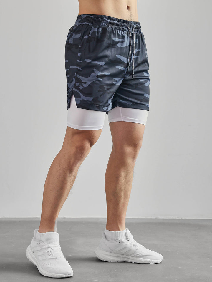 Man performing dynamic movement in Kinetic mesh shorts, showcasing athletic performance.