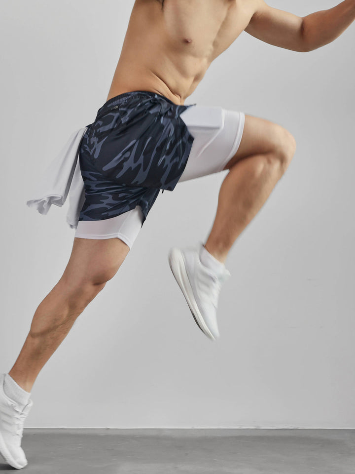 Men's Kinetic mesh shorts with functional pockets, ideal for active gym workouts.