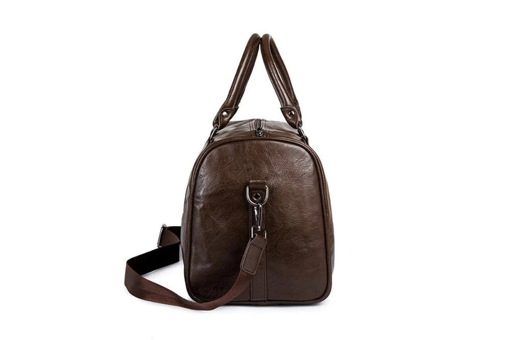 Men's leather carry-on duffel bag, compact and lightweight for effortless travel.