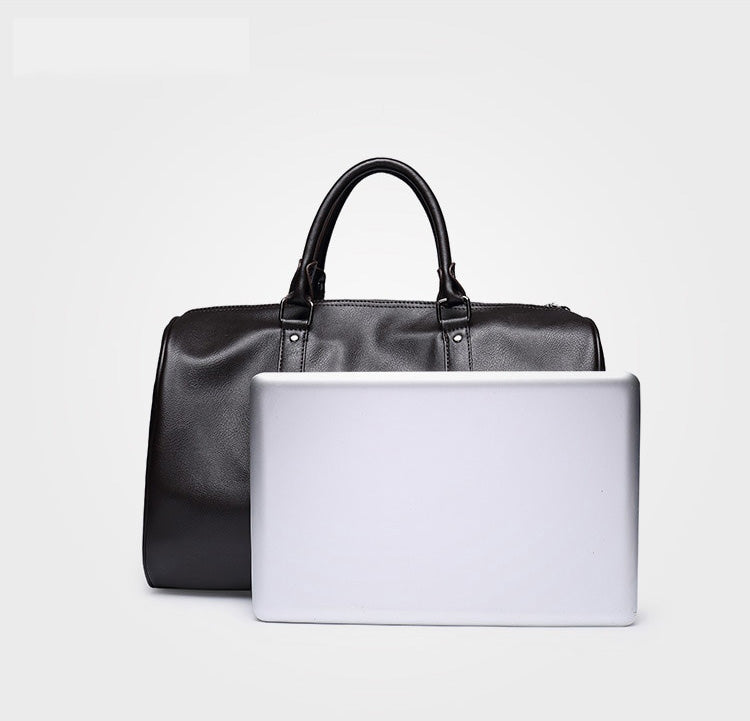 Spacious men's leather travel duffel, ideal lightweight carry-on weekend bag.
