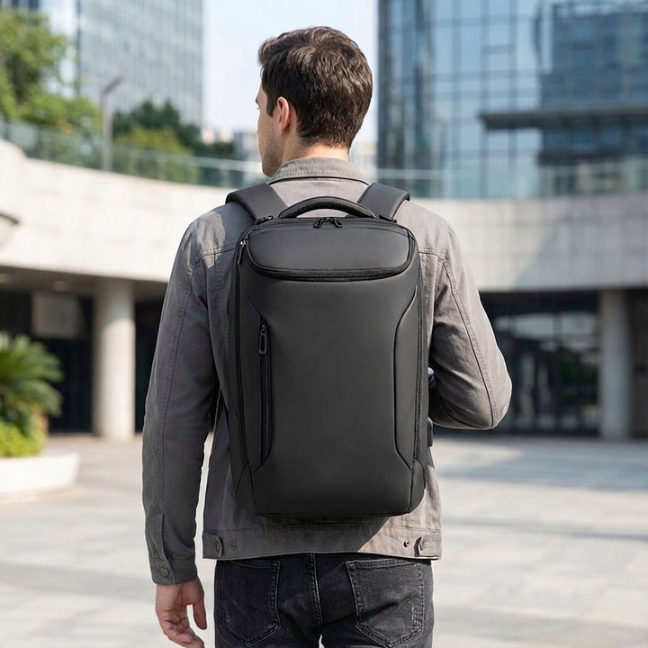 Men's large waterproof business travel backpack with laptop compartment. Ideal for commute & professional use.