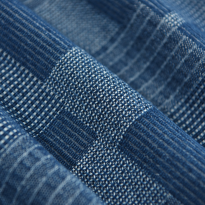 Versatile men's lightweight blue denim shirt, offering effortless style & all-day comfort for any casual occasion.