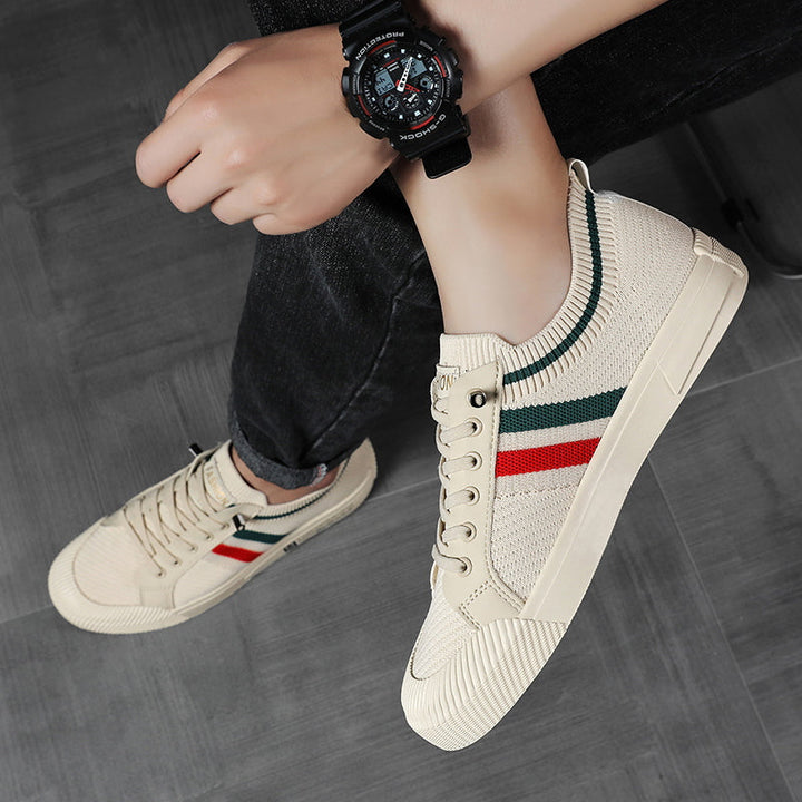 Lightweight men's sneakers with lace-up closure for casual style.