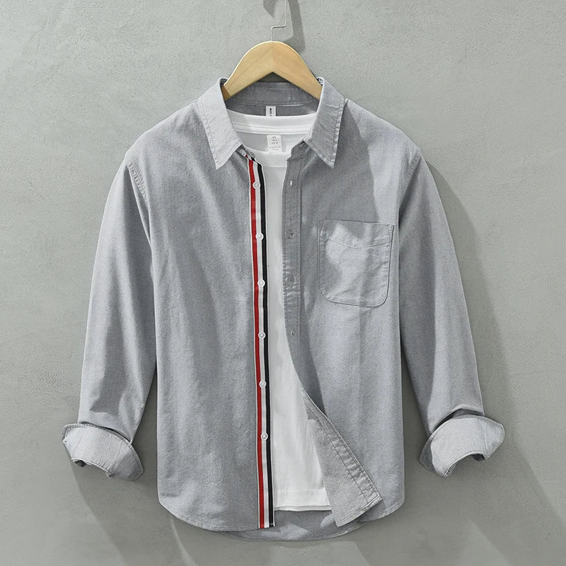 Relaxed fit men's long sleeve button-up shirt. Lightweight fabric for comfortable, effortless style.