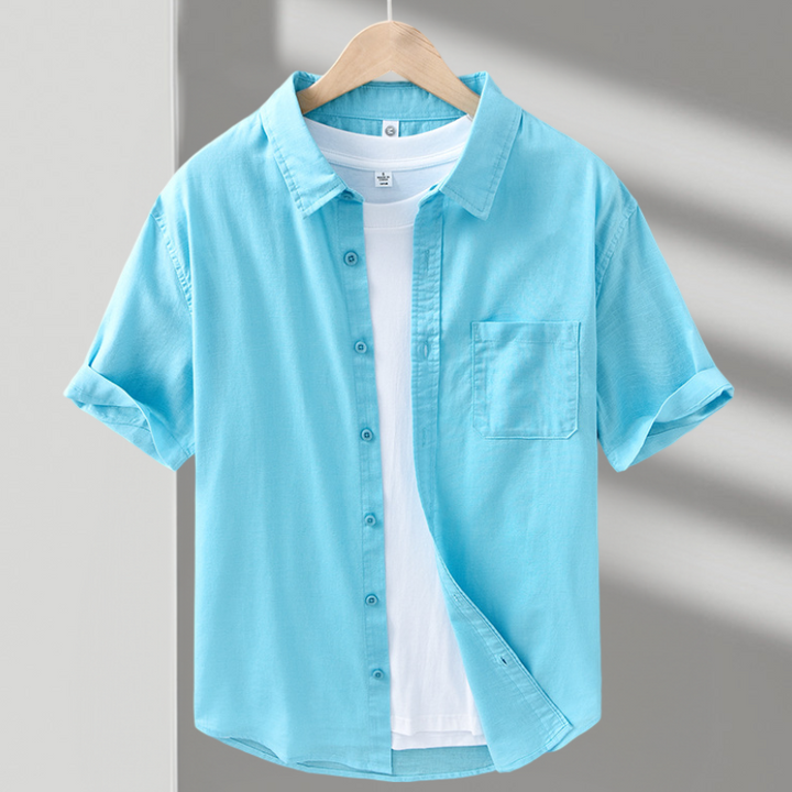 Breathable men's button-up shirt, perfect for warm weather casual outfits.