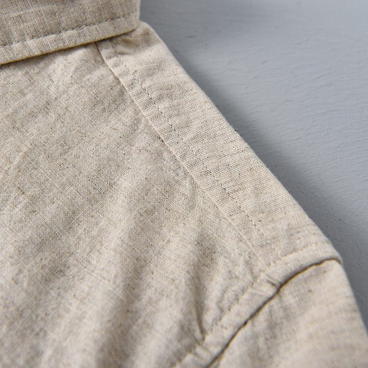 Casual men's button-up shirt, relaxed fit, perfect for summer style.