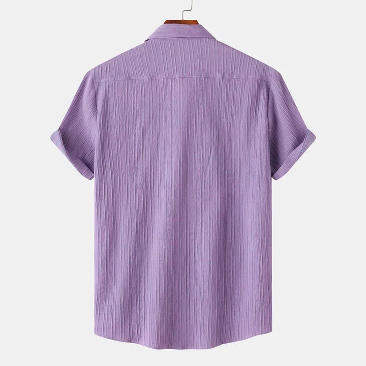 Comfortable men's lightweight coastal button-down shirt with a spread collar. Perfect for summer fashion.