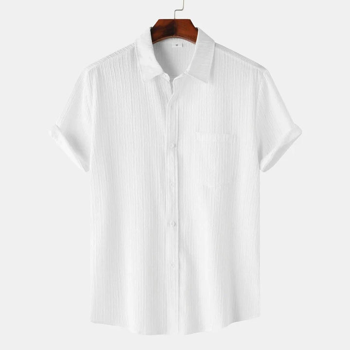 Men's lightweight coastal button-down shirt, designed for supreme comfort & effortless summer style. Resort wear.
