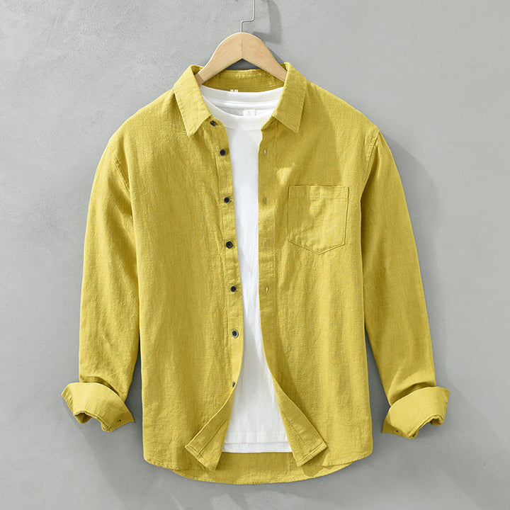 Man wearing a relaxed fit men's comfort shirt, showcasing its versatile button-down design for casual wear.